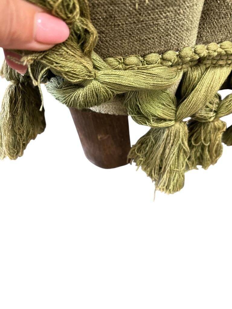 Vintage green club chair with fringes