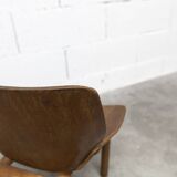 Atypical 1960s curved wood children's chair