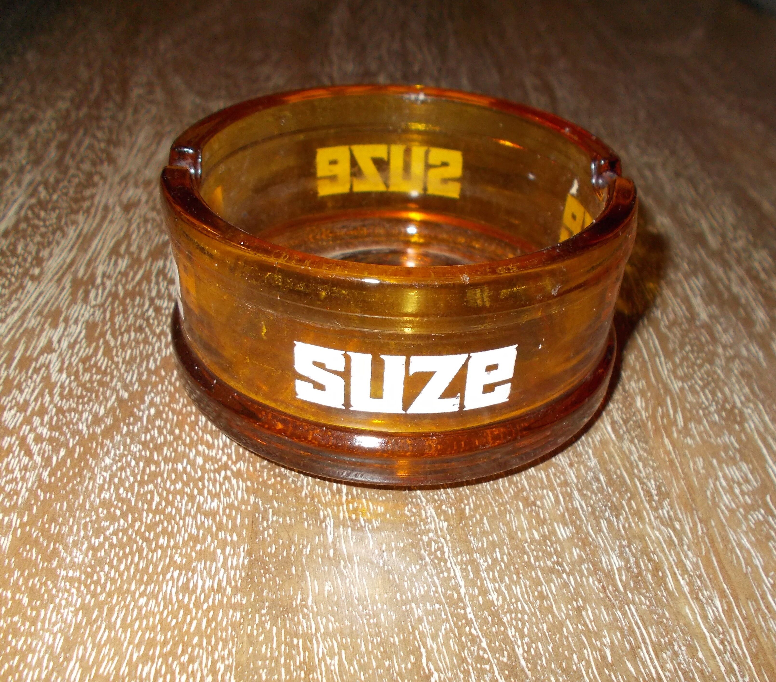 Advertising ashtray Suze amber glass