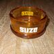 Advertising ashtray Suze amber glass
