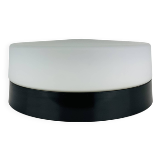 Erco round opaline wall light from the 1960s