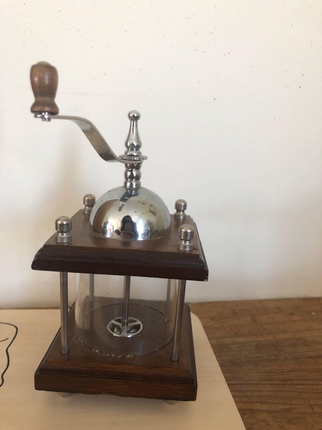 Small old manual pepper or spice mill