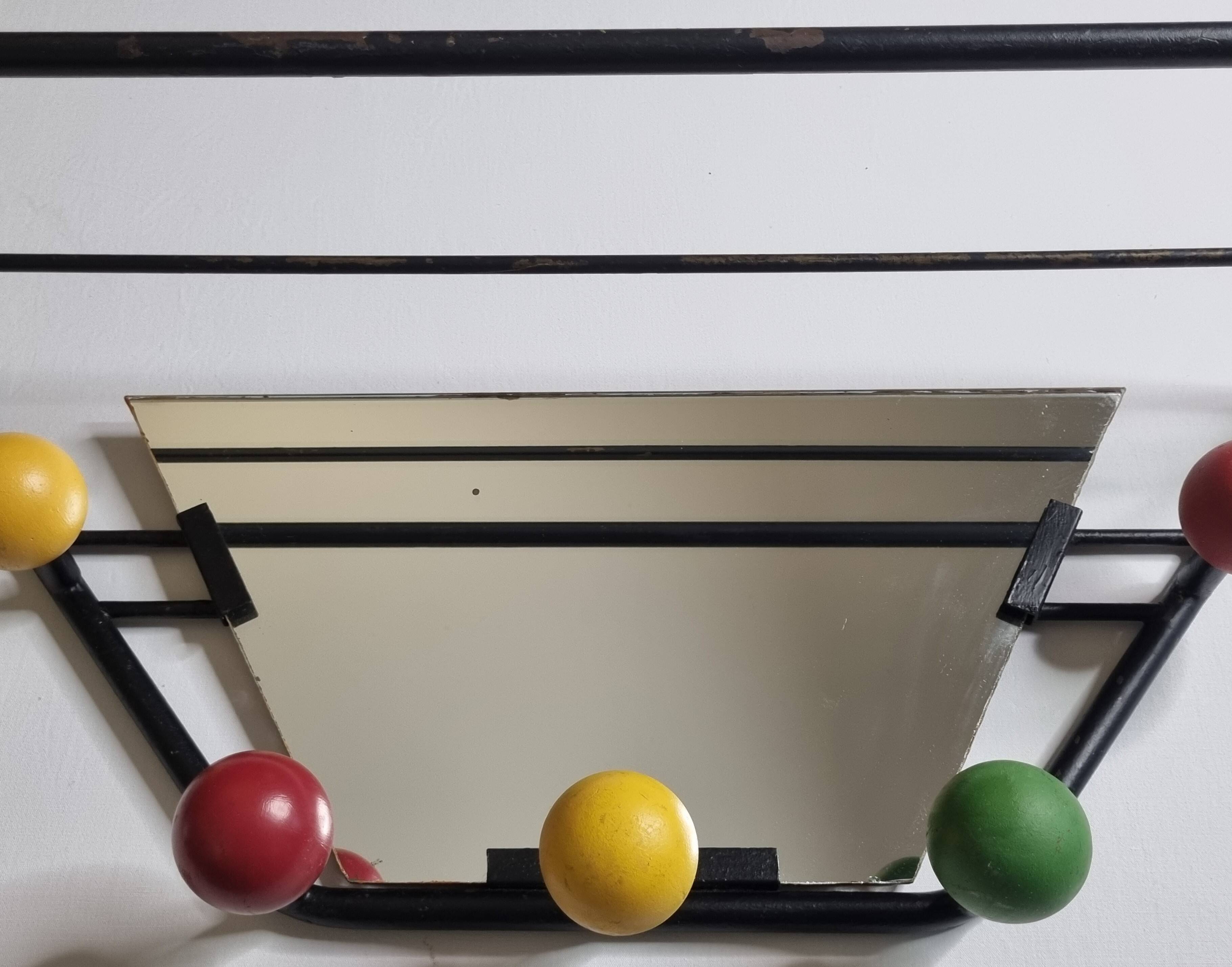 Wall-mounted coat rack with mirror, 5 hooks and hat holder from the 1950s-60s.