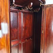 Edwardian mahogany bow-fronted wardrobe by Maple & Co