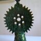 Green ceramic sun candlestick from Tamegroute, Morocco.