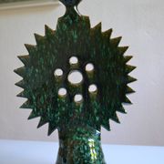 Green ceramic sun candlestick from Tamegroute, Morocco.