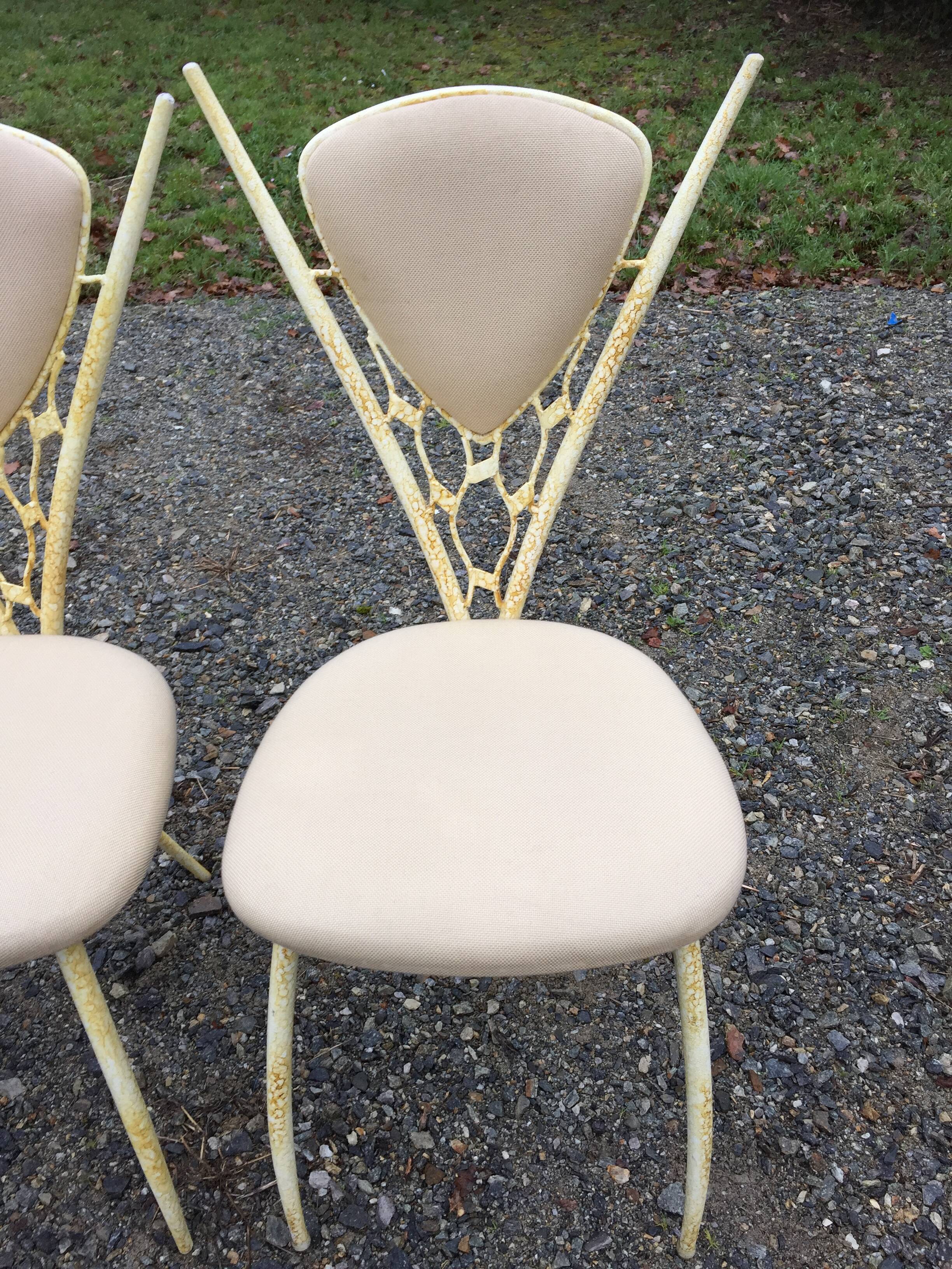 4 vintage chairs in tubular metal lacquered white yellow.
