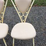 4 vintage chairs in tubular metal lacquered white yellow.