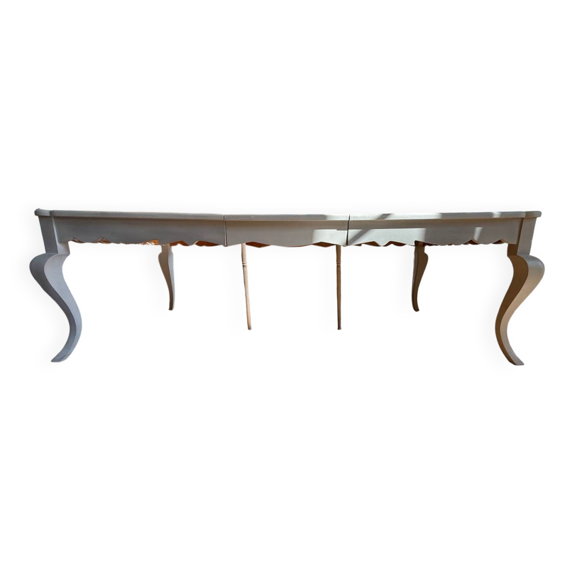 Large solid wood table made by a cabinetmaker.