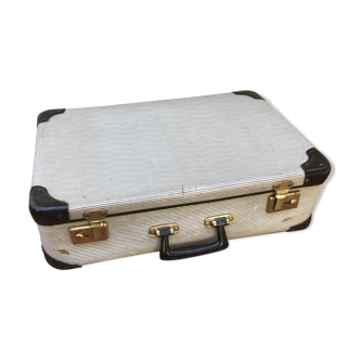 Old grey travel trunk suitcase