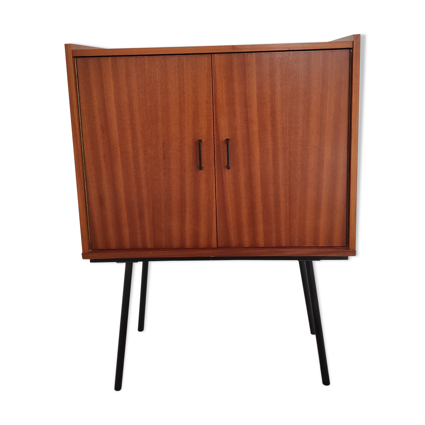 Piece of furniture on high feet metal compass