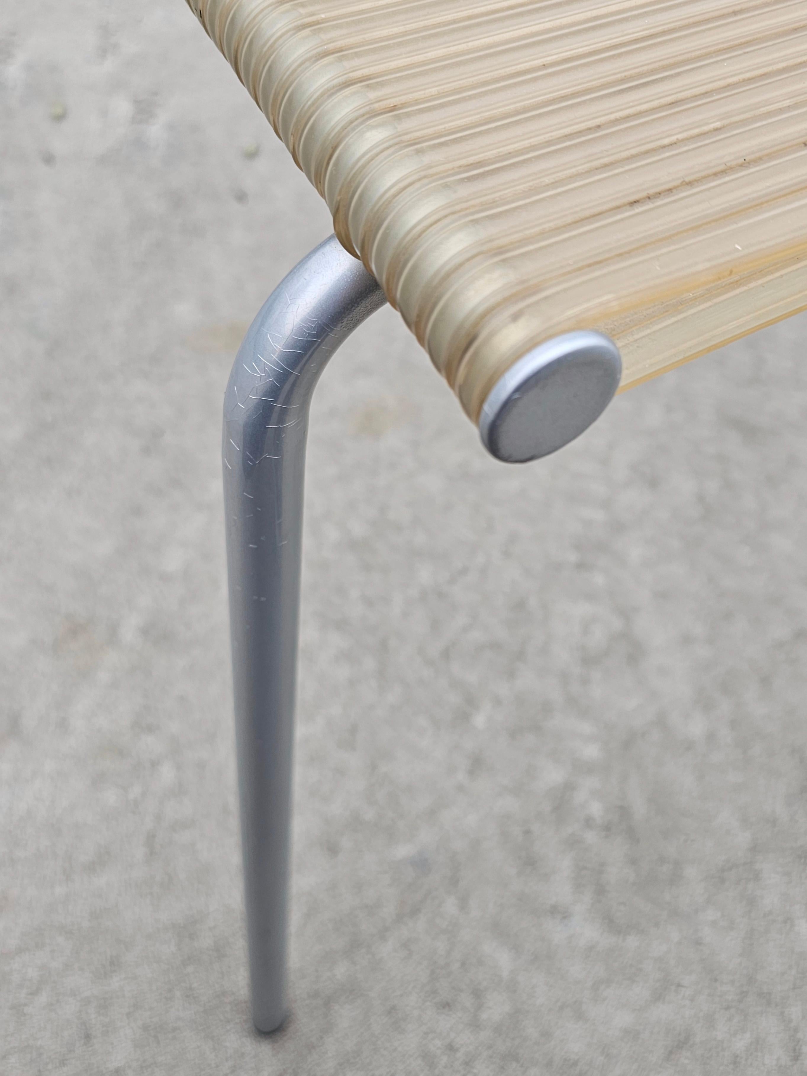 Set of 4 Miss B dining chairs by Tito Agnoli for Bonacina, 1990s.