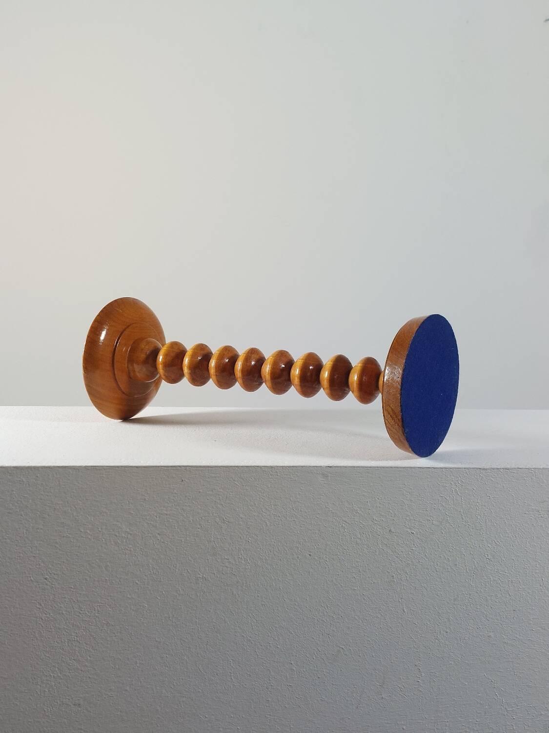 Vintage mid-century wooden candlestick, spool decoration from the 1970s.