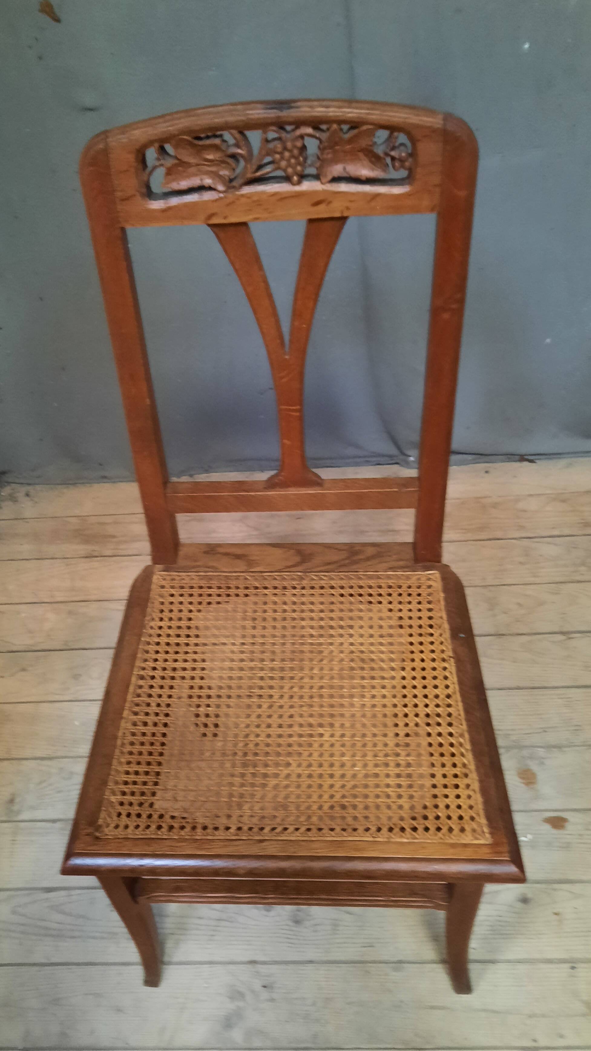 Cane chair in the style of Gauthier Poinsignon