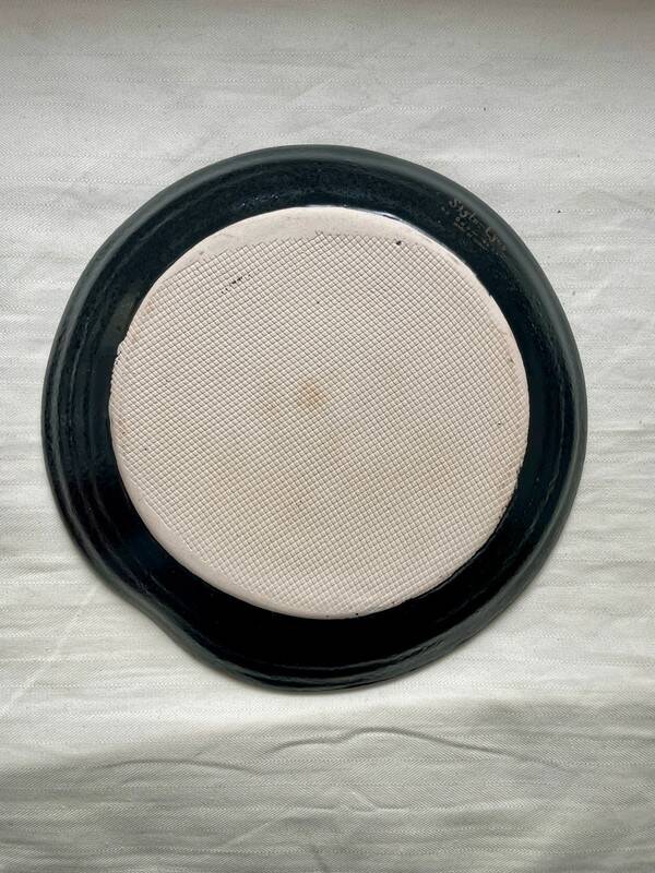 Black and blue ceramic plate