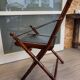 Fauteuil style colonial pliant cuir et teck