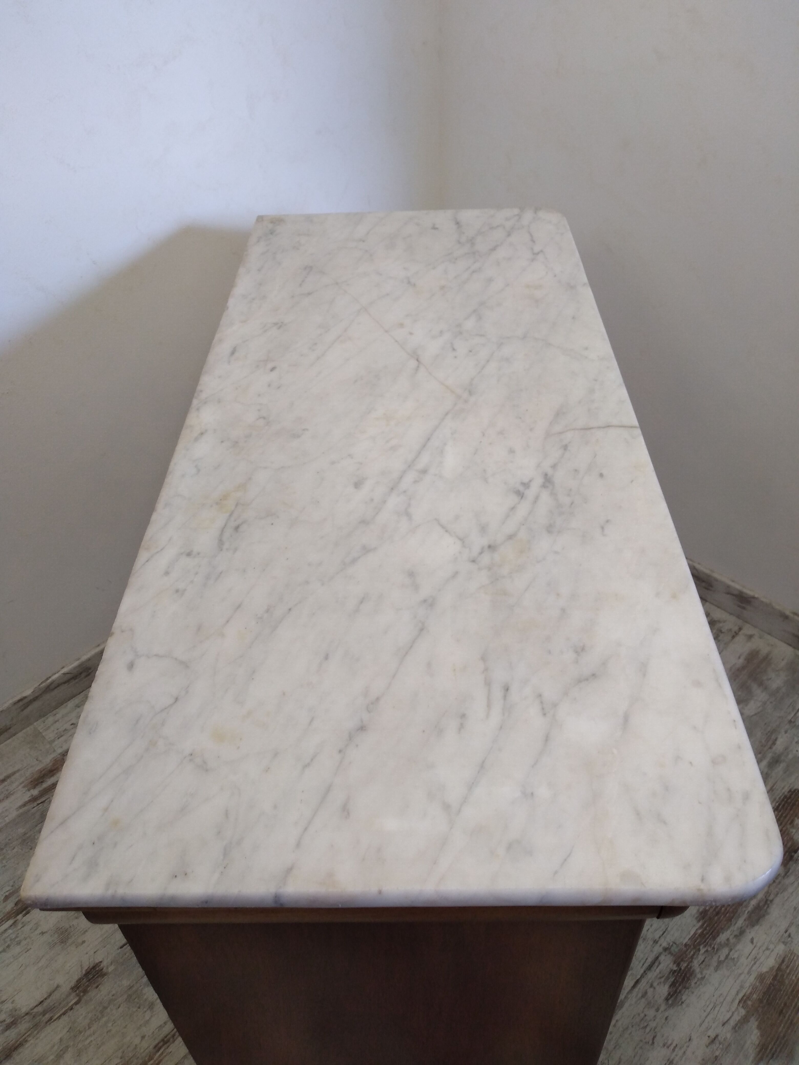 Old chest of drawers with marble