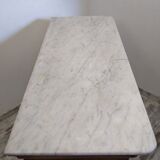 Old chest of drawers with marble