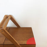 Red compass foot worker