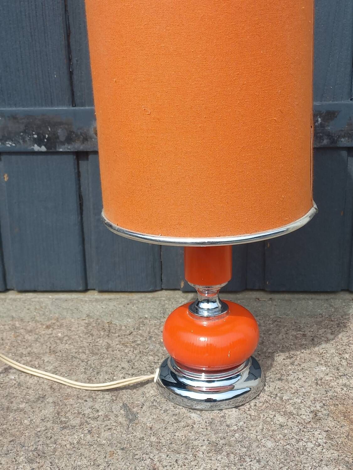 Designer lamp from the 70s in chrome metal and orange lacquered wood