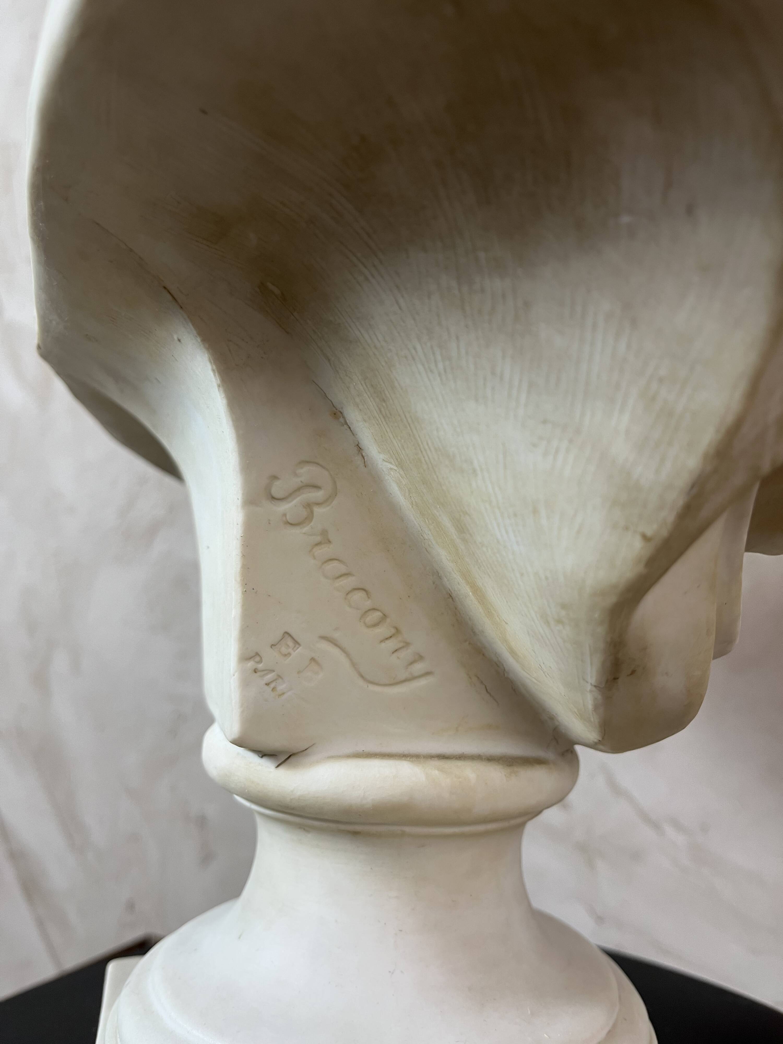 Bust of a woman in Biscuit signed