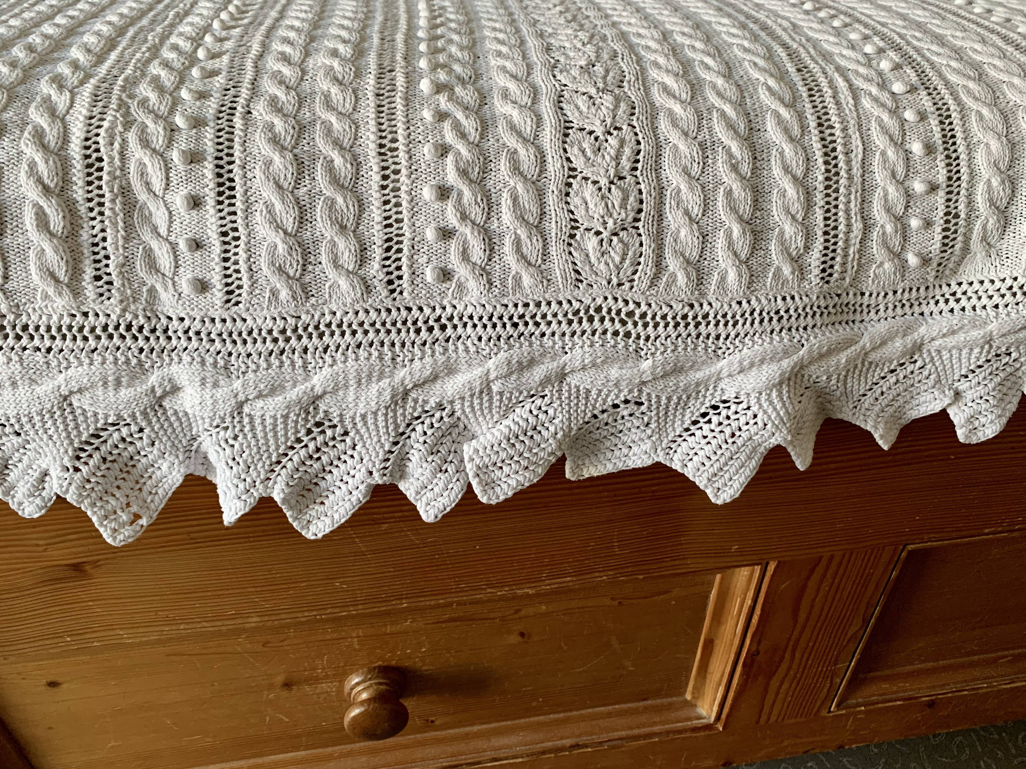 Old knitted cotton bed cover