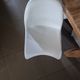 10 white chairs in the style of Verner Panton