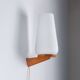 Wall lamp with opal glass shade on wooden base by Philips