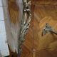 Louis XV style curved chest of drawers in marquetry