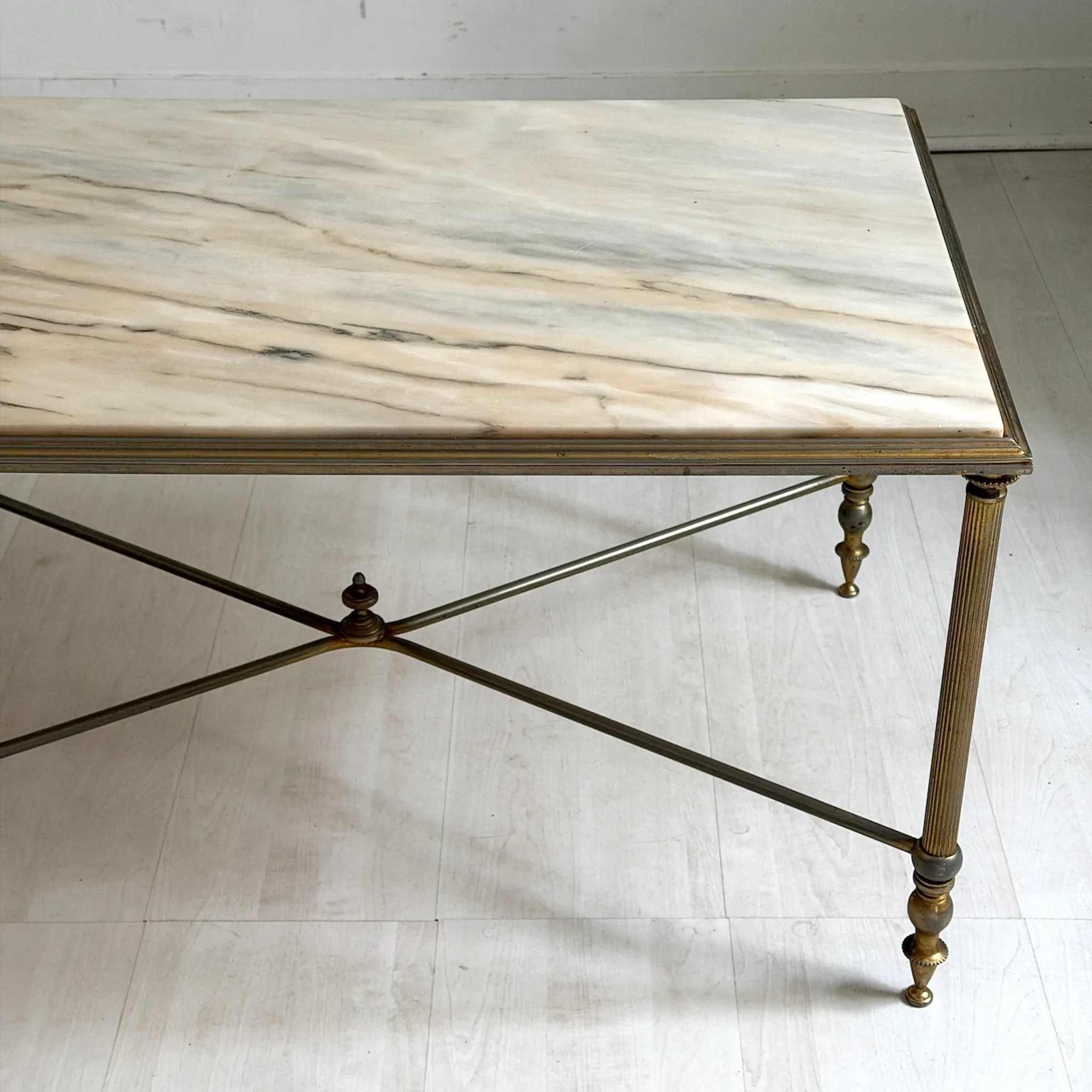 Vintage coffee table in 1970s neoclassical style.
