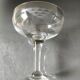 Set of 6 Baccarat-style champagne glasses. Stylized grape cluster decoration.