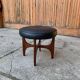 Mid-Century teak and black leather ottoman stool by Kofod Larsen for G-Plan, 1960s