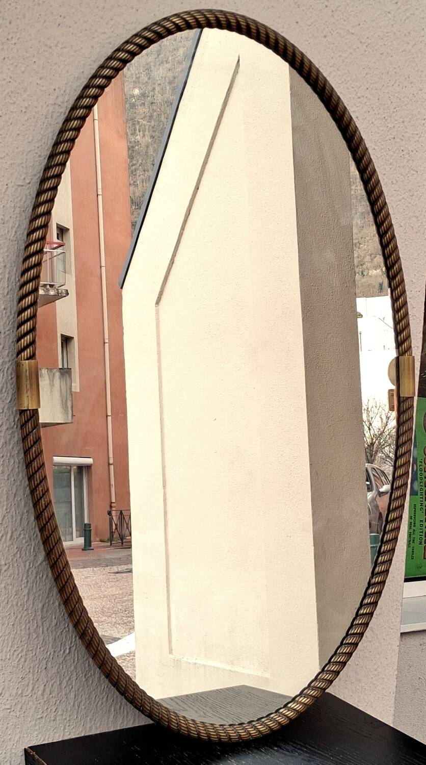Antique mirror with twisted brass frame from the 60s 70s.