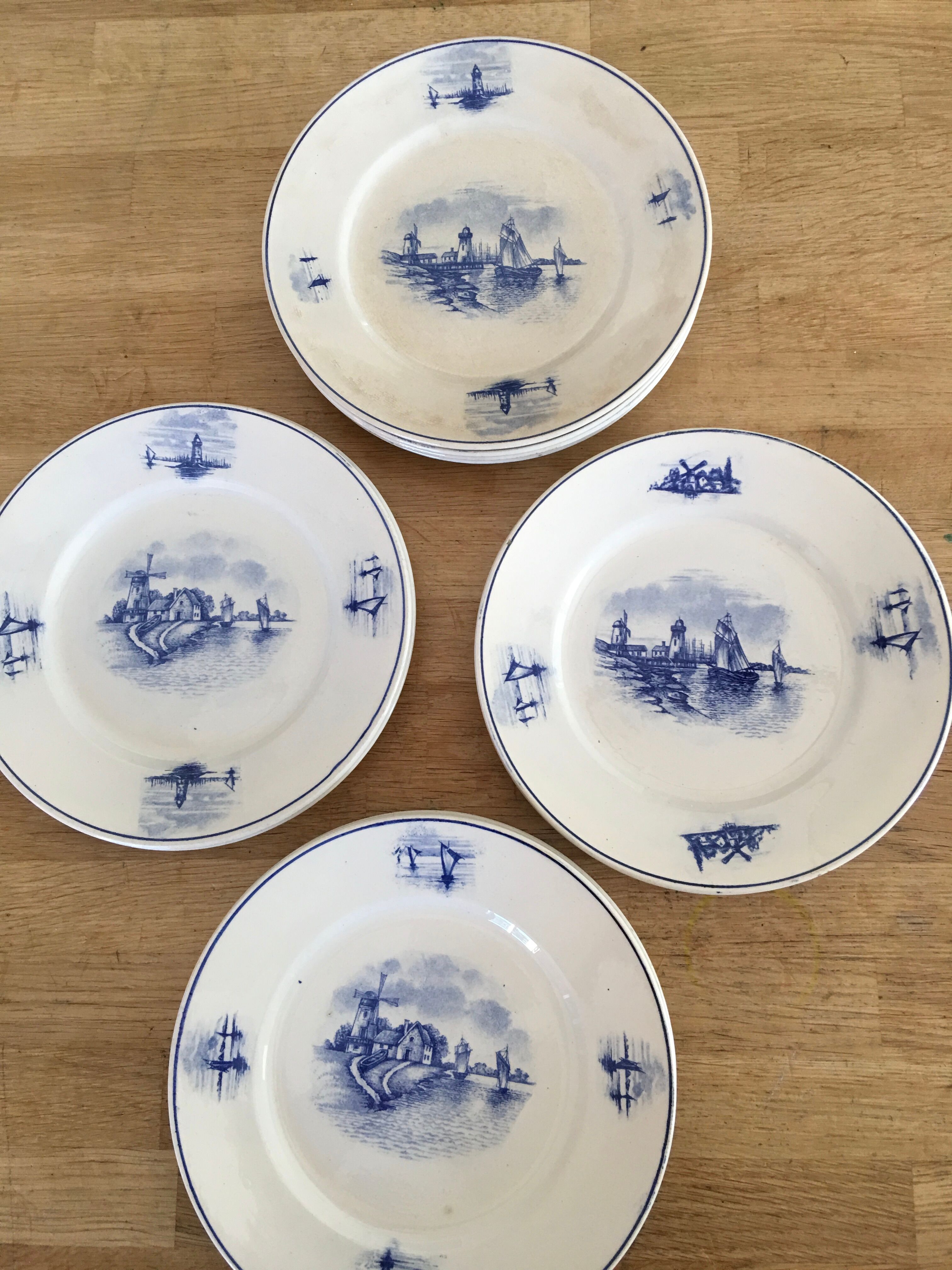 Series of 11 flat plates, Dutch earthenware, early XX