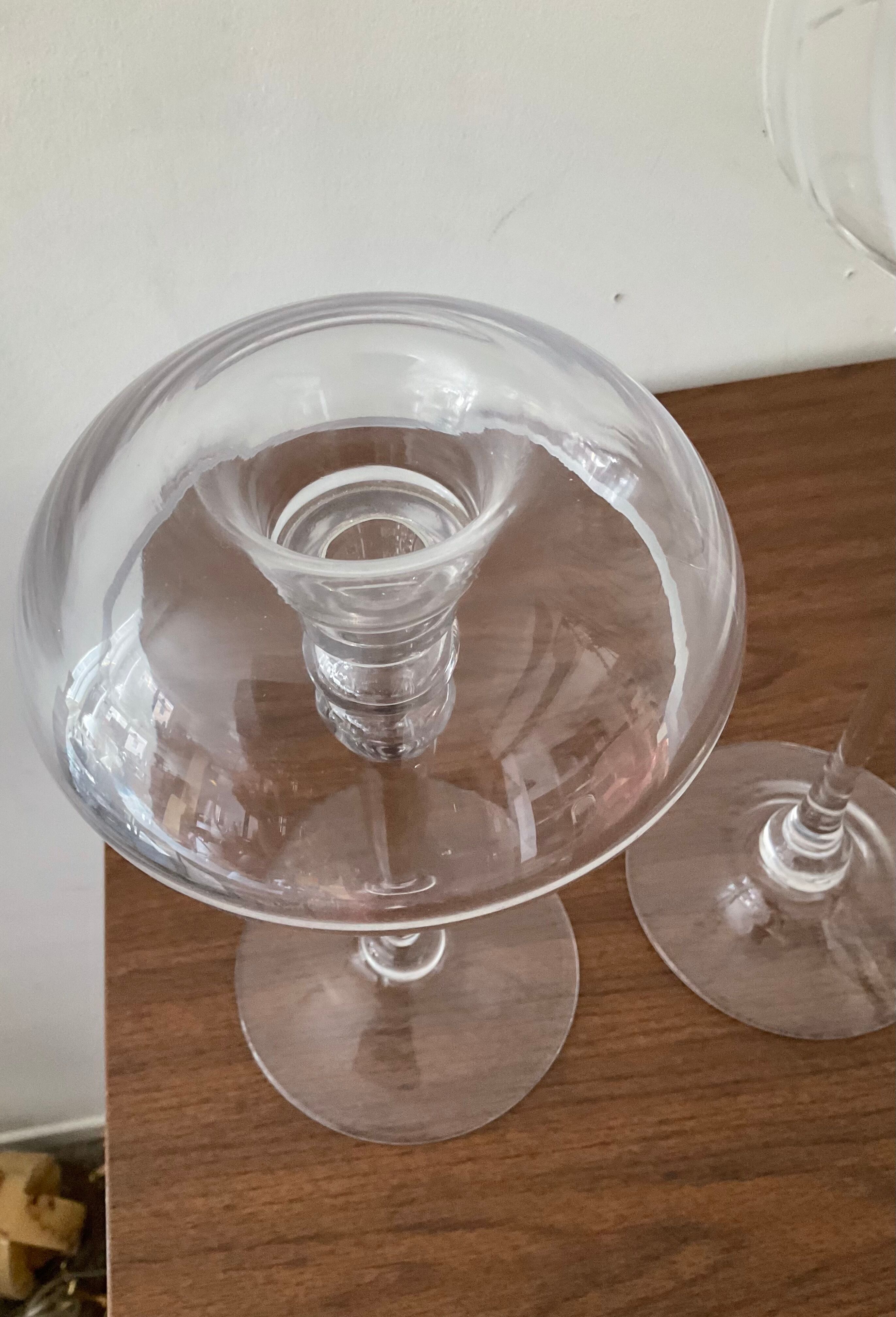 Pair of candle holders in glass paste