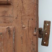 Large 17th century Monastery doors in terracotta lacquered oak, Portugal