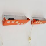 Pair of Scandinavian wall sconces with swivel shade in orange metal. 70
