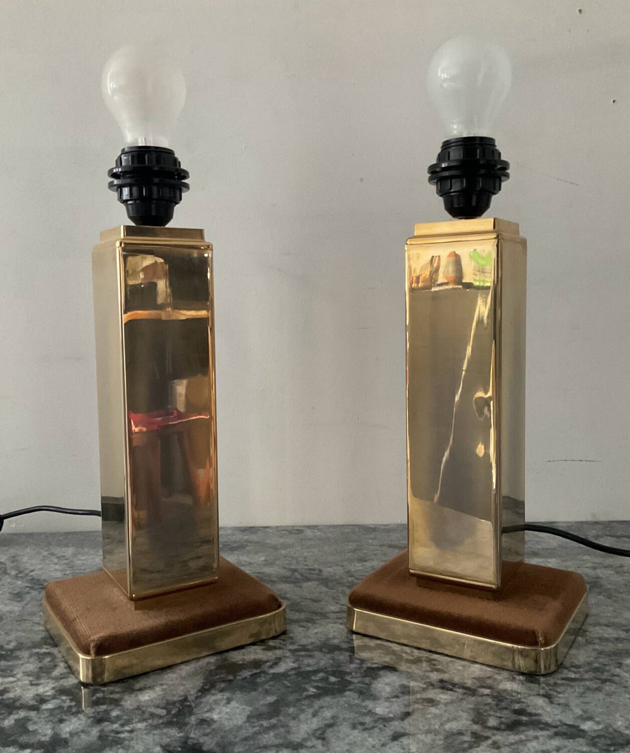 Pair of Hollywood Regency brass table lamps from the 1970s.