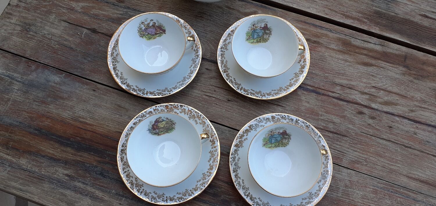 Set of 4 cups and sugar bowl Haute porcelaine de Berry