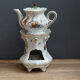 Old earthenware herbal tea maker