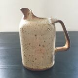 Speckled beige sandstone pitcher