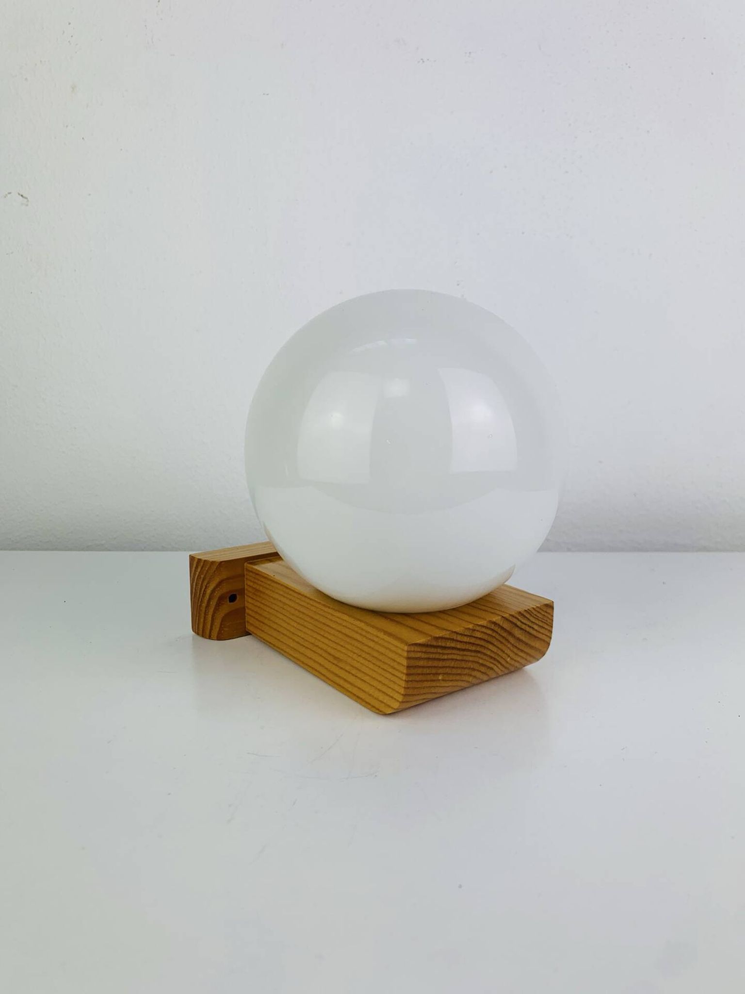Vintage Tissot opaline globe and pin wall light.