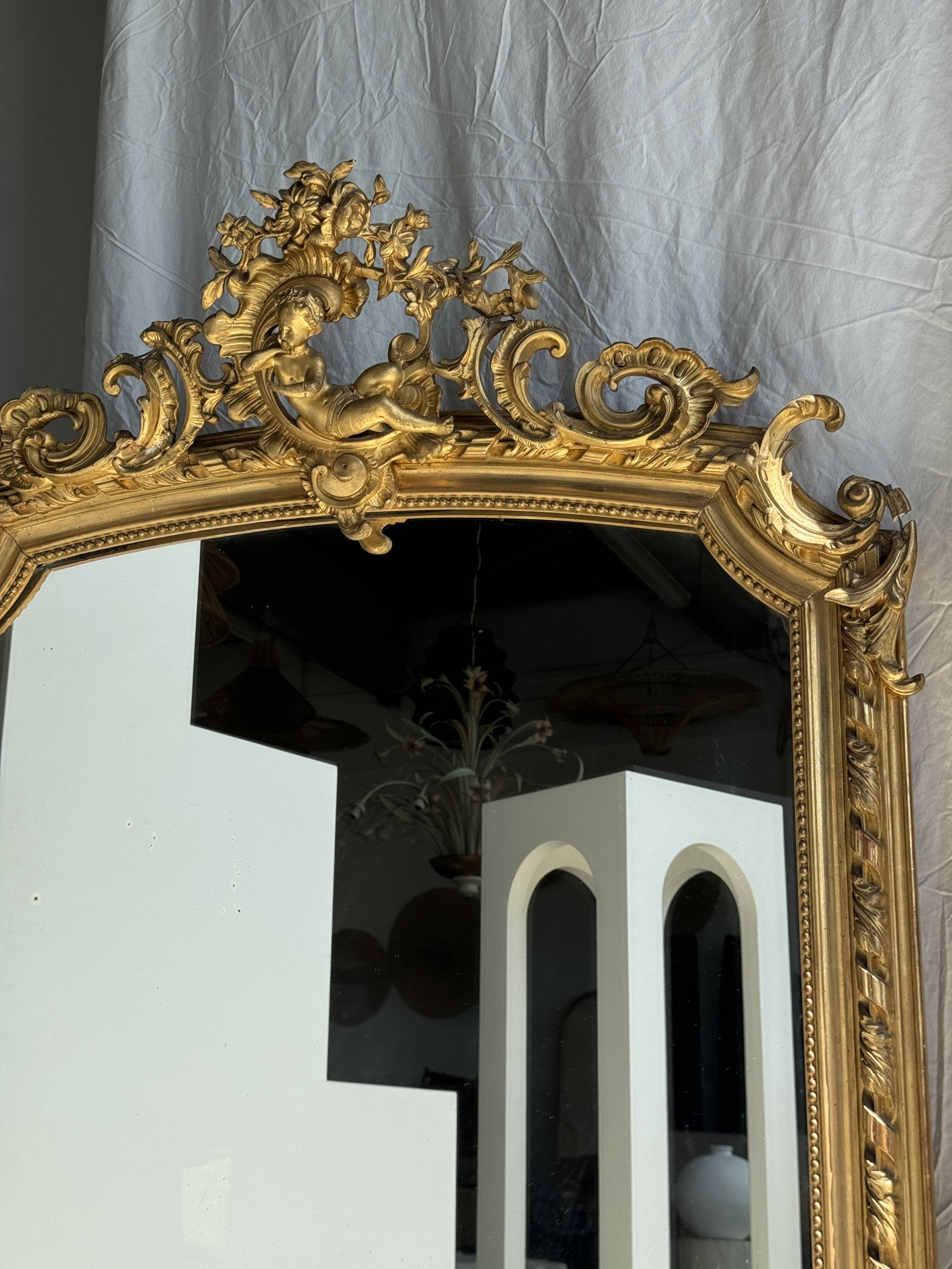 Large gilded mirror with acanthus leaf pediment H150 L98