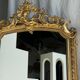Large gilded mirror with acanthus leaf pediment H150 L98