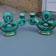 Two green ceramic candlesticks from the 1930s-1940s.