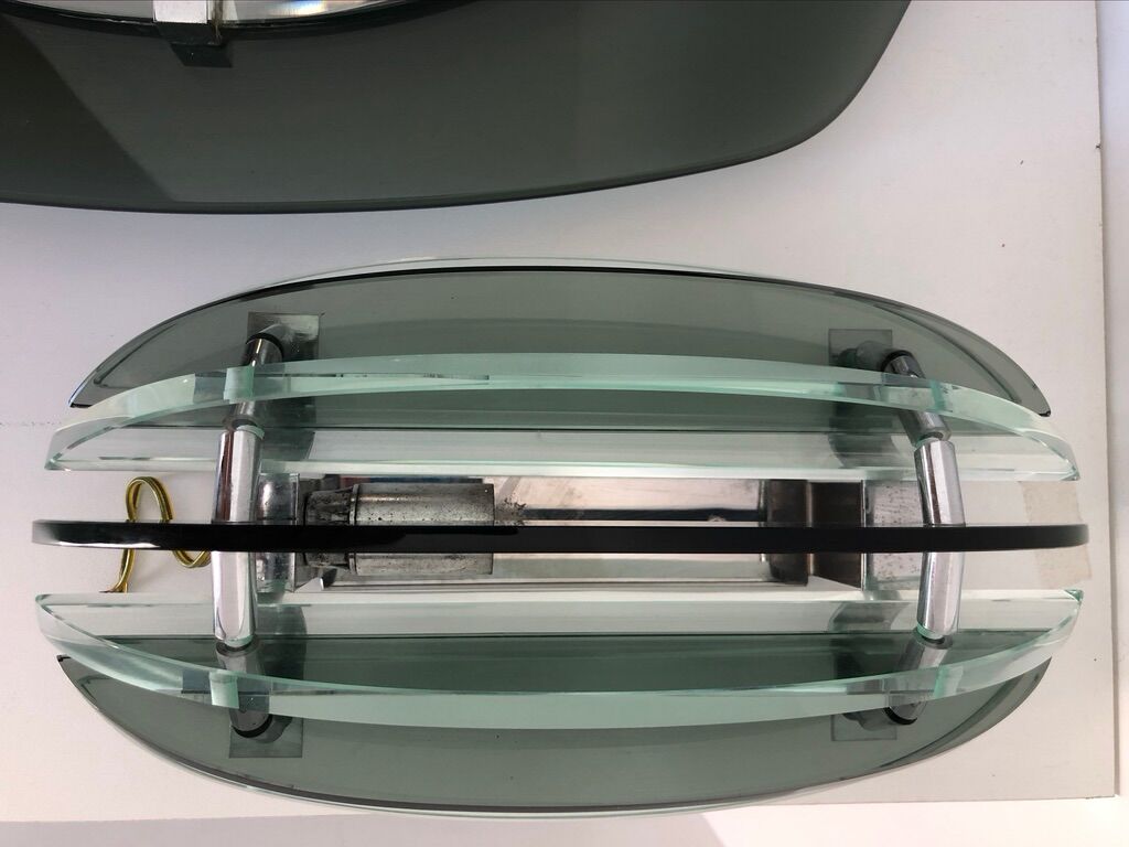 Veca mirror and 2 matching Veca wall lights made in Italy.