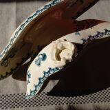 Old gravy boat on frame in terre de fer earthenware by gien, “chardons” model in blue-green