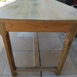 Large honey-colored farmhouse table in solid oak