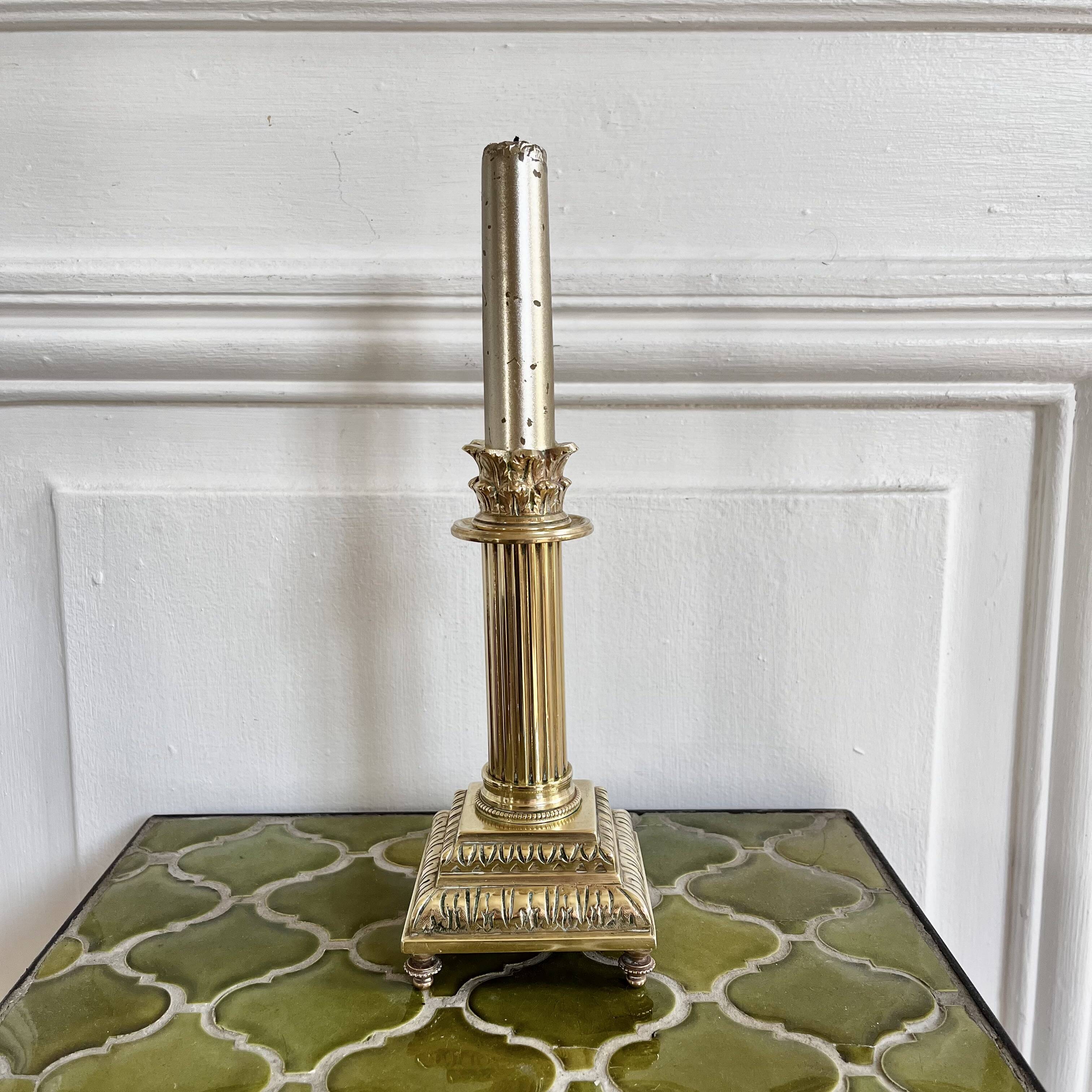 Empire style gold candle holder