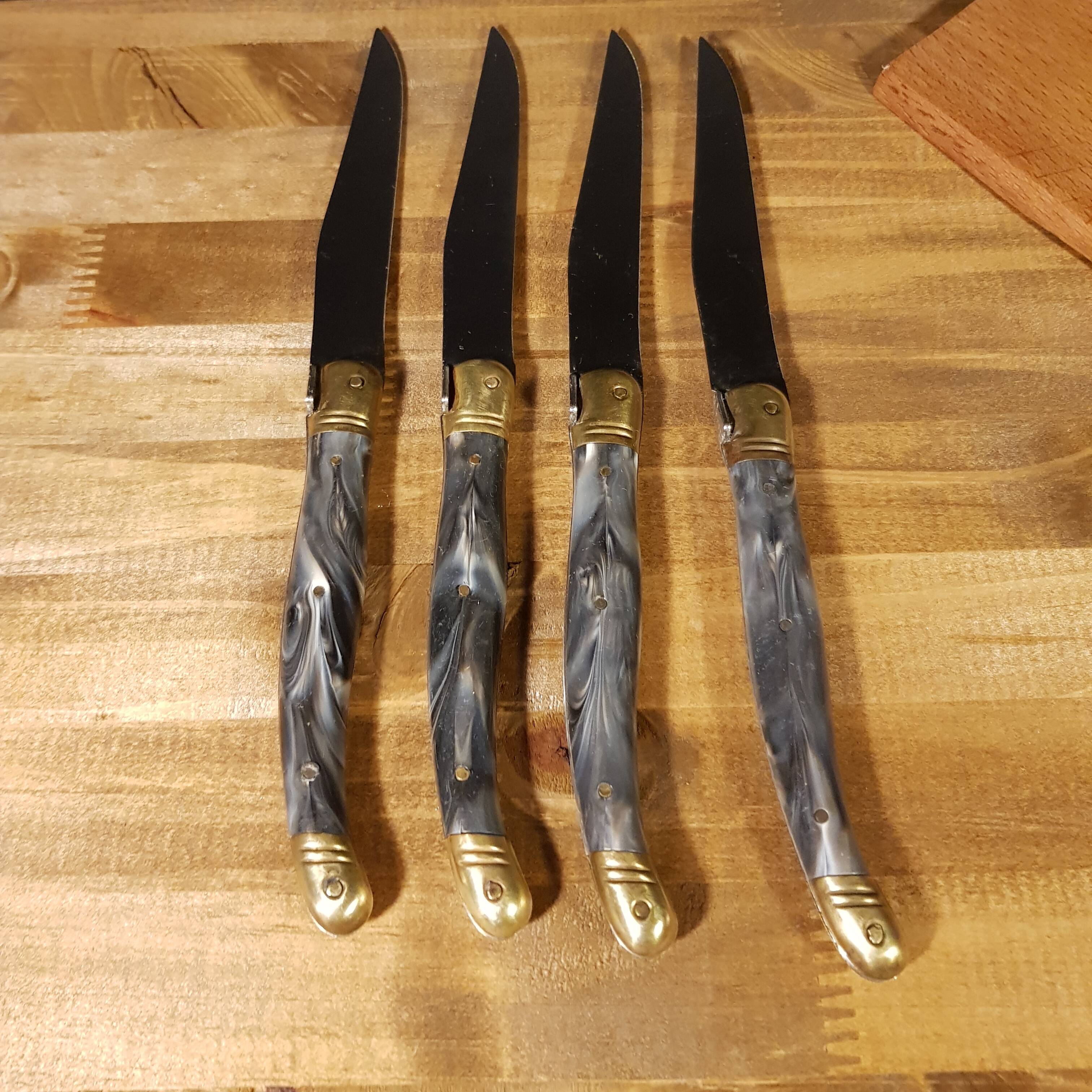4 Laguiole table knives and large knife